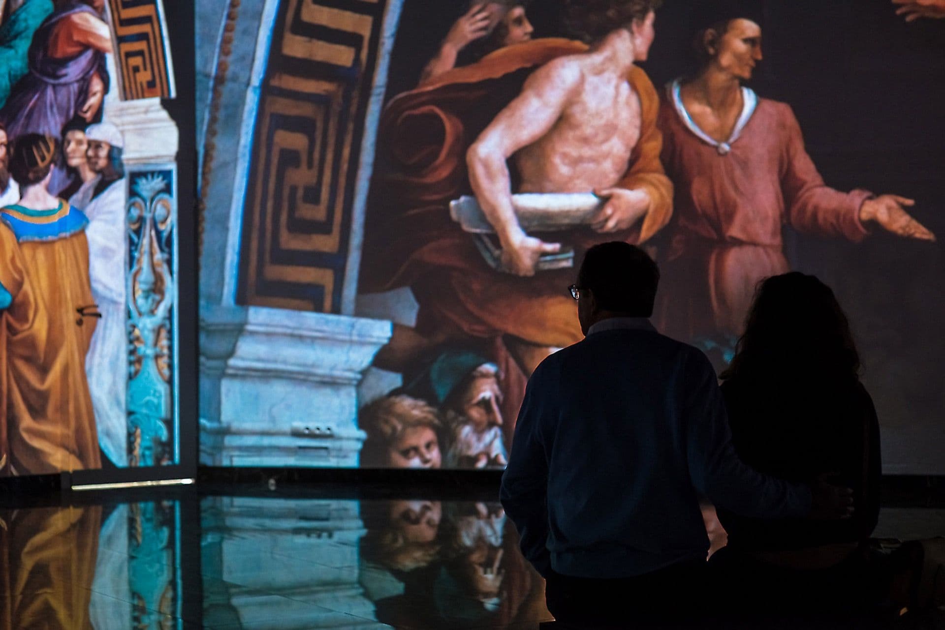 Visitors enjoying the Renaissance multimedia exhibition